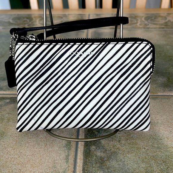 Coach Handbags - Coach Rehab zebra print wristlet